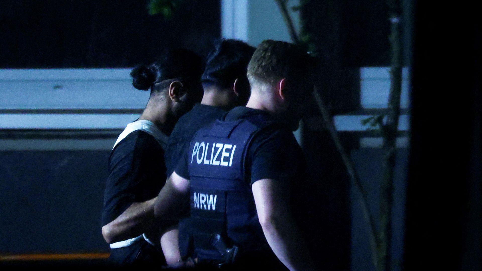 German prosecutors name and charge suspect after three people were killed at festival