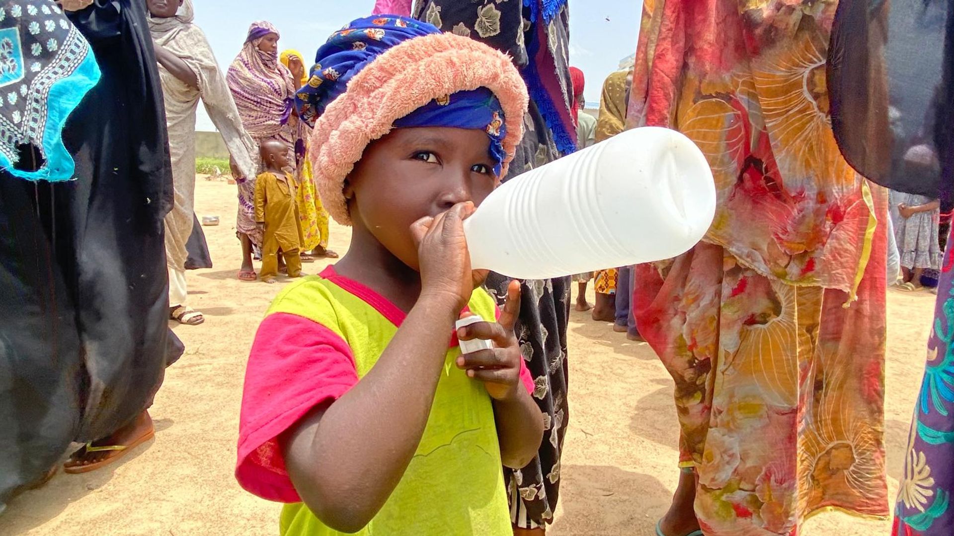 As Sudan’s war rages on, trucks crammed with aid have been sitting in the sun for weeks