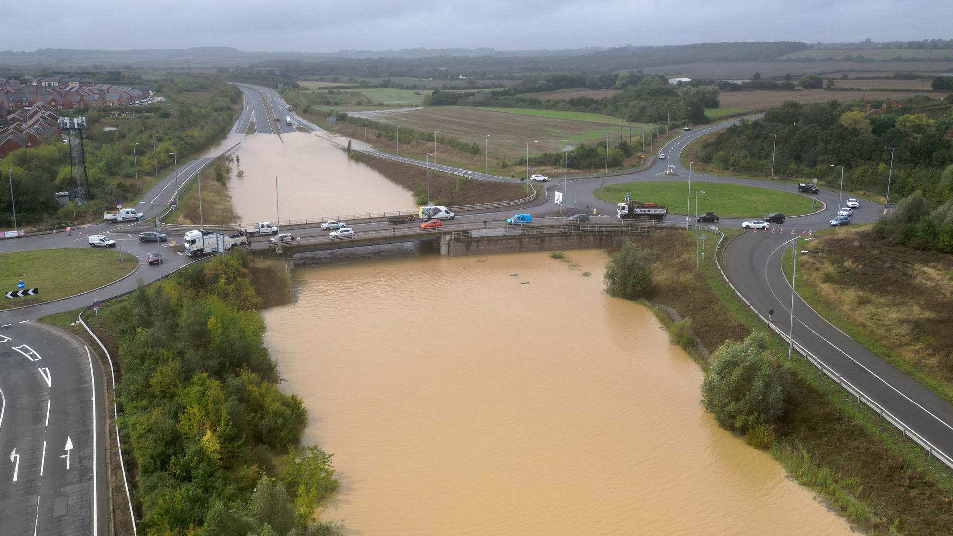 Floods trigger travel disruption – as fresh weather warning issued