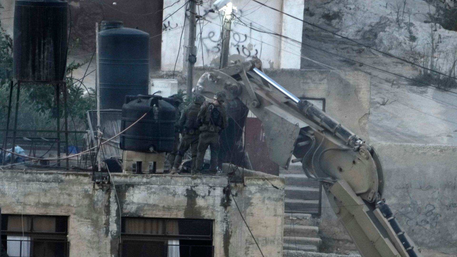 Israeli soldiers filmed pushing ‘lifeless bodies from roofs’ in West Bank