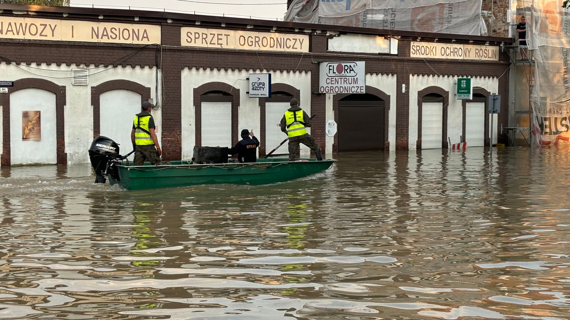 Boats better than cars in Polish town where floods have damaged 80% of homes