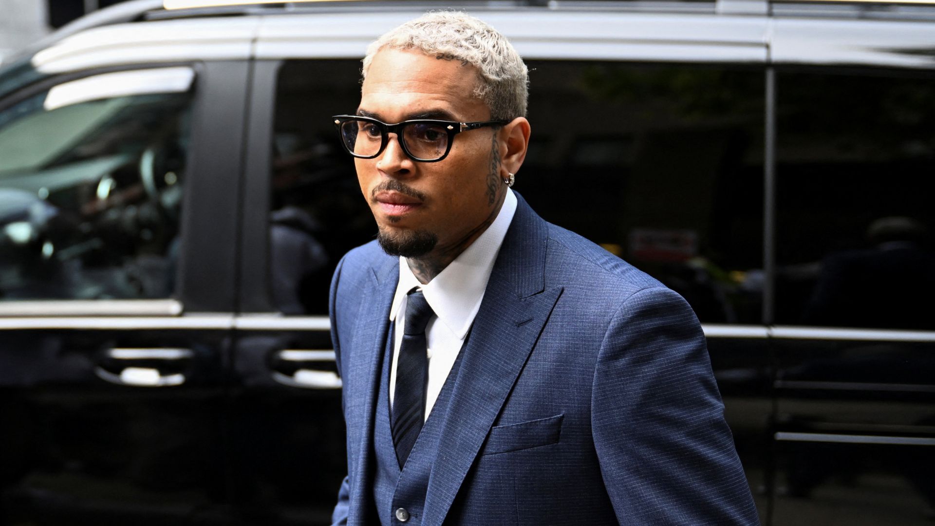 US singer Chris Brown pleads not guilty to attempting to cause GBH