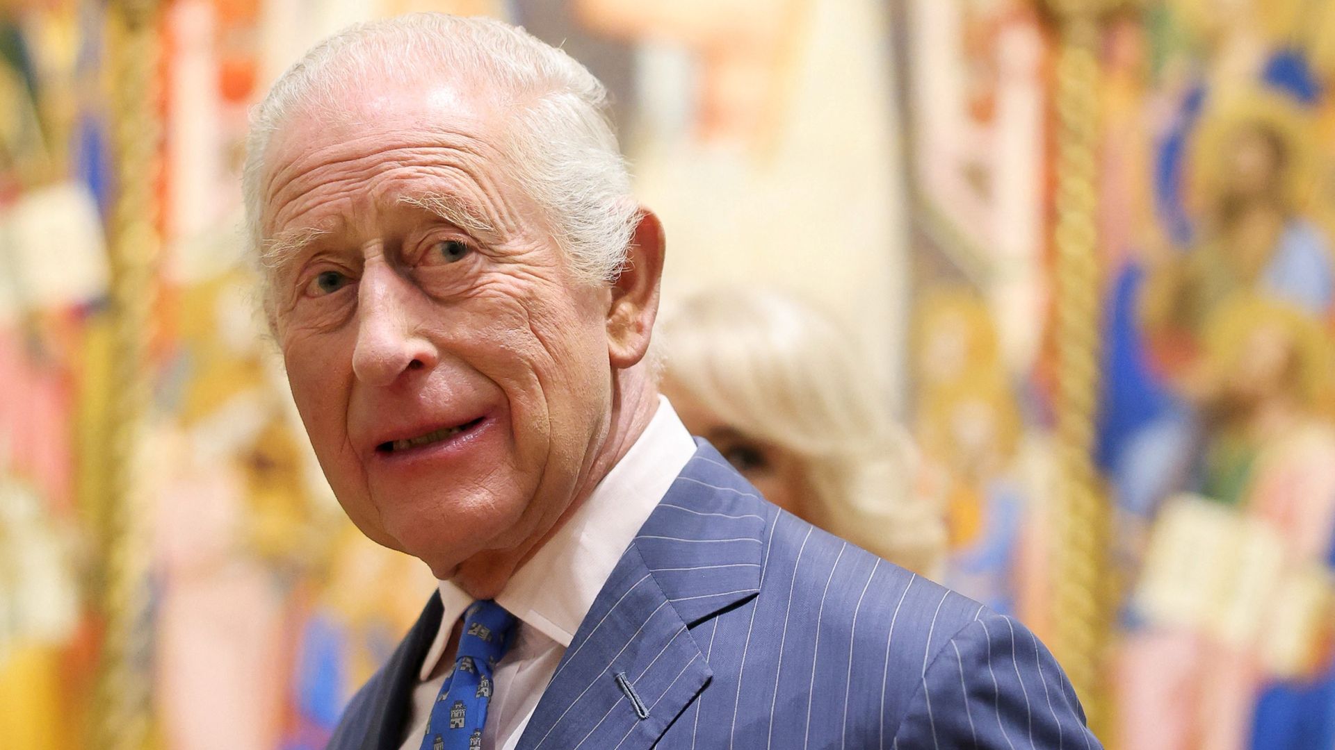 A humanoid robot has painted a picture of Charles. How did it do? 